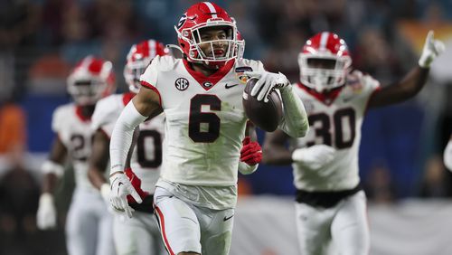 Georgia defensive back Daylen Everette (6) celebrates his interception during the third quarter against Florida State during Georgia’s 63-3 win in the Orange Bowl at Hard Rock Stadium, Saturday, Dec. 30, 2023, in Miami Gardens, Florida. (Jason Getz / Jason.Getz@ajc.com)