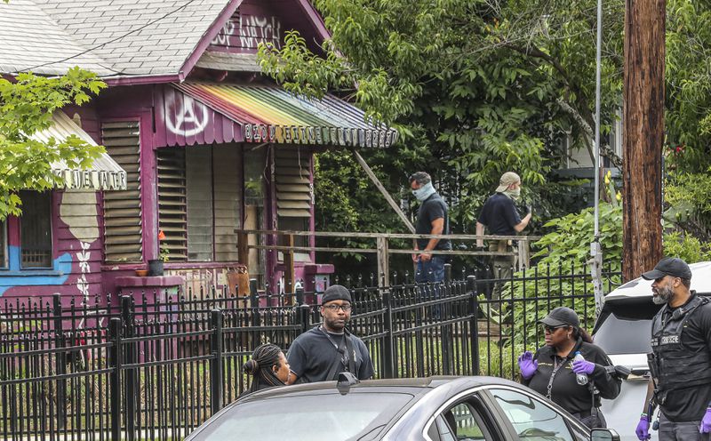 May 31, 2023 Atlanta: Atlanta Police Officers and GBI agents were at the Teardown House on Mayson Avenue in Atlanta conducting a search warrant. Three people were arrested and charged with crimes related to the Atlanta Public Safety Center.
 (John Spink / John.Spink@ajc.com)

