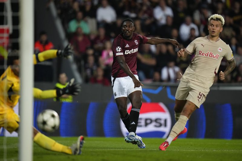 Sparta's Victor Olatunji scores his side's second goal during the Champions League opening phase soccer match between Sparta Prague and Salzburg in Prague, Czech Republic, Wednesday, Sept. 18, 2024. (AP Photo/Petr David Josek)