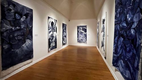 “Indigo Prayers” is located in a small, rectangular gallery where the seven paintings immerse the viewer in feelings of swirling movement and energy.