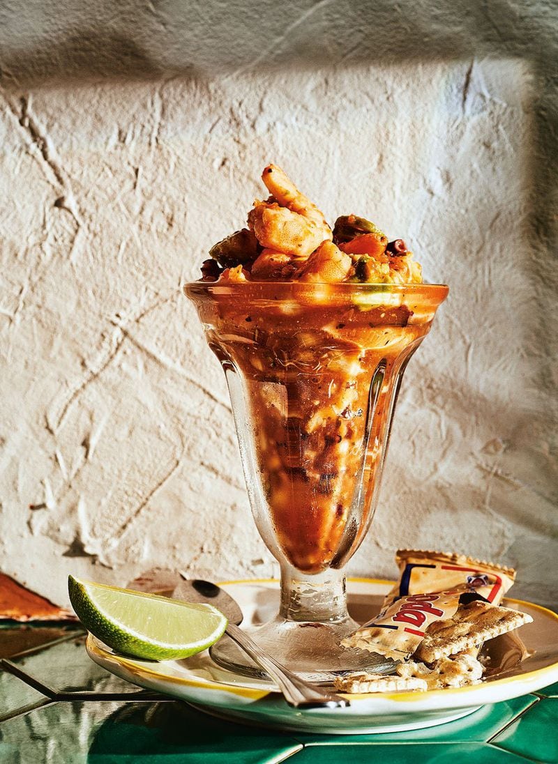 Campechana de Mariscos, a spicy seafood parfait, from “Tex-Mex: Traditions, Innovations, and Comfort Foods From Both Sides of the Border” by Ford Fry and Jessica Dupuy. CONTRIBUTED BY JOHNNY AUTRY