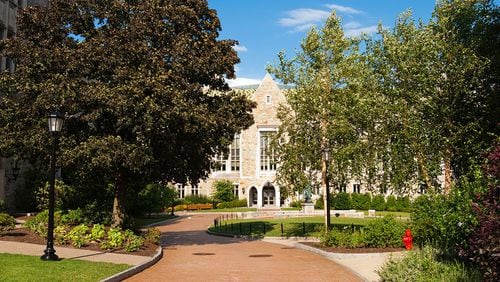 A brick walkway at the Boston College campus in Chestnut Hill, Massachusetts, leading up to a brick building.