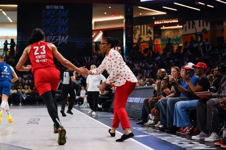 Atlanta Dream head coach Tanisha Wright shakes hands with guard Aerial Powers after making a basket during the first half at Gateway Center Arena, Sunday, May 26, 2024, in Atlanta.
(Miguel Martinez / AJC)