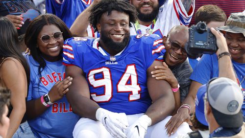 Buffalo Bills defensive tackle Prince Emili (94) sits in the stands following a preseason NFL football game, Saturday, Aug. 13, 2022, in Orchard Park, N.Y. The Bills won 27-24. (AP Photo/Jeffrey T. Barnes)