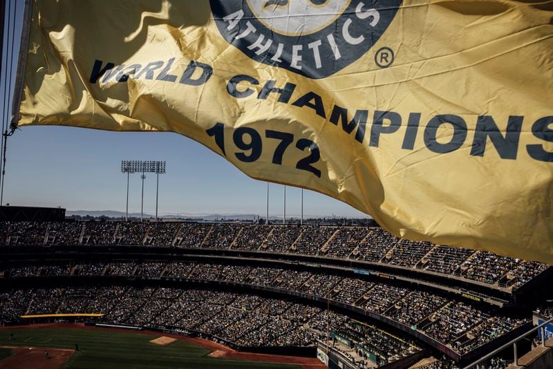 Fans are seen at Oakland Coliseum during a baseball game between the Oakland Athletics and the Texas Rangers in Oakland, Calif., Thursday, Sept. 26, 2024. (Stephen Lam/San Francisco Chronicle via AP)