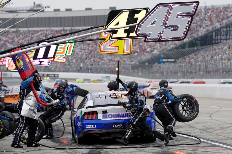 Ryan Preece brings his car into the pit for tires and fuel during during a NASCAR Cup Series race, Sunday, June 23, 2024, at New Hampshire Motor Speedway, in Loudon, N.H. (AP Photo/Steven Senne)