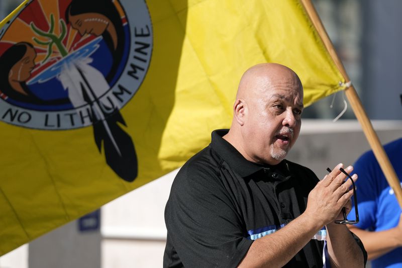 Duane Clark, chairman of the Hualapai Tribe, join other members of the Hualapai Tribe as they gathered to try to persuade a federal judge to extend a temporary ban on exploratory drilling for a lithium project at U.S. District Court Tuesday, Sept. 17, 2024, in Phoenix. (AP Photo/Ross D. Franklin)