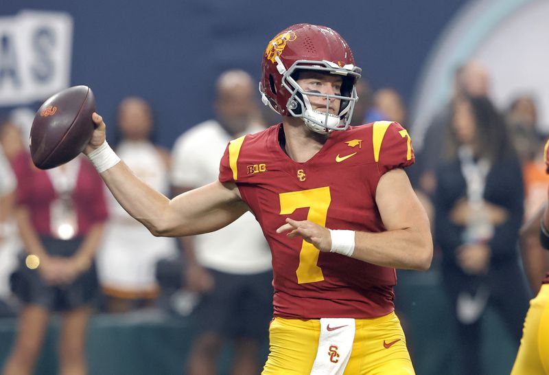 Southern California quarterback Miller Moss looks to pass during the first half of an NCAA college football game against LSU, Sunday, Sept. 1, 2024, in Las Vegas. (AP Photo/Steve Marcus)