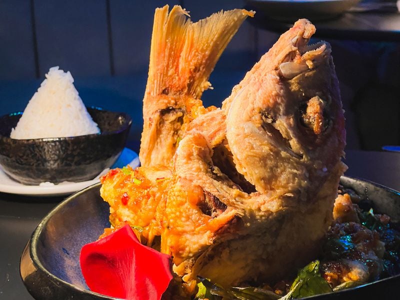 You can get pla tod, a whole fried snapper, at Bar of Thailand). Henri Hollis/henri.hollis@ajc.com