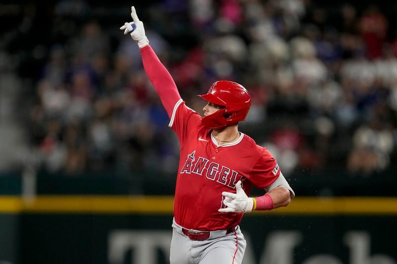 Los Angeles Angels' Logan O'Hoppe celebrates after his three-run home run against the Texas Rangers in the sixth inning of a baseball game Friday, Sept. 6, 2024, in Arlington, Texas. (AP Photo/Tony Gutierrez)