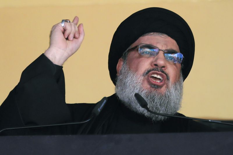 FILE - In this Oct. 24, 2015 file photo, Hezbollah leader Sheik Hassan Nasrallah addresses a crowd during the holy day of Ashoura, in a southern suburb of Beirut, Lebanon. (AP Photo/Hassan Ammar, File)