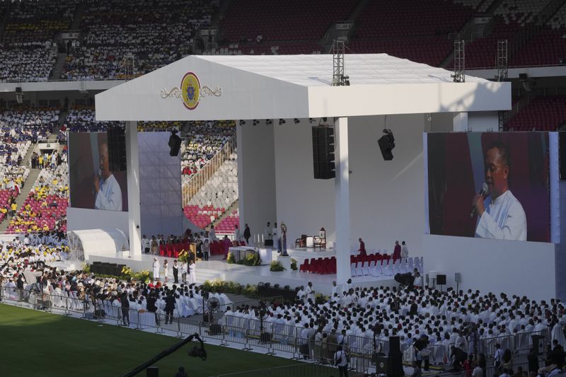 The stage is seen set for the holy mass to be led by Pope Francis at Gelora Bung Karno Stadium in Jakarta, Indonesia, Thursday, Sept. 5, 2024. (AP Photo/Dita Alangkara, Pool)