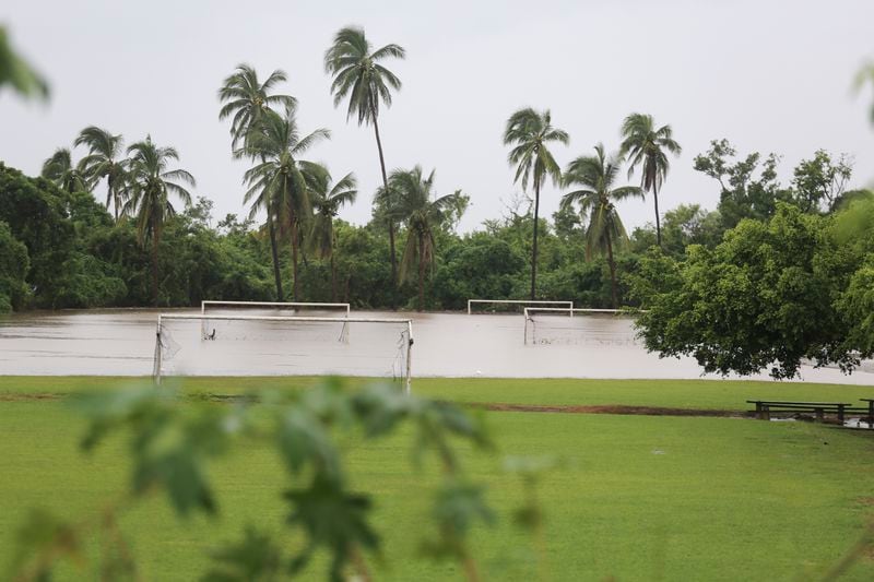 A soccer field sits partially submerged by floodwaters in the aftermath of Hurricane John, in Acapulco, Mexico, Friday, Sept. 27, 2024. (AP Photo/Bernardino Hernandez)