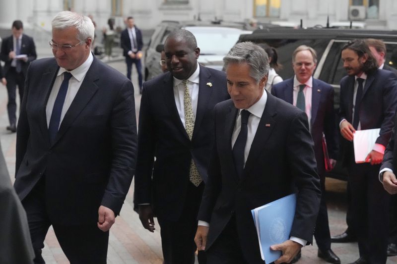 U.S. Secretary of State Antony Blinken, right, Britain's Foreign Secretary David Lammy, and Ukraine's Foreign Minister Andriiy Sybiha, left, arrive to attend a joint news conference at the Ministry of Foreign Affairs in Kyiv, Ukraine, Wednesday, Sept. 11, 2024. (AP Photo/Efrem Lukatsky)