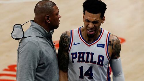 Philadelphia 76ers forward Danny Green (14) reacts as he walks off the court past head coach Doc Rivers before heading to the locker room, during the first half of Game 3 of second-round playoff series against the Atlanta Hawks, Friday, June 11, 2021, in Atlanta. (John Bazemore/AP)