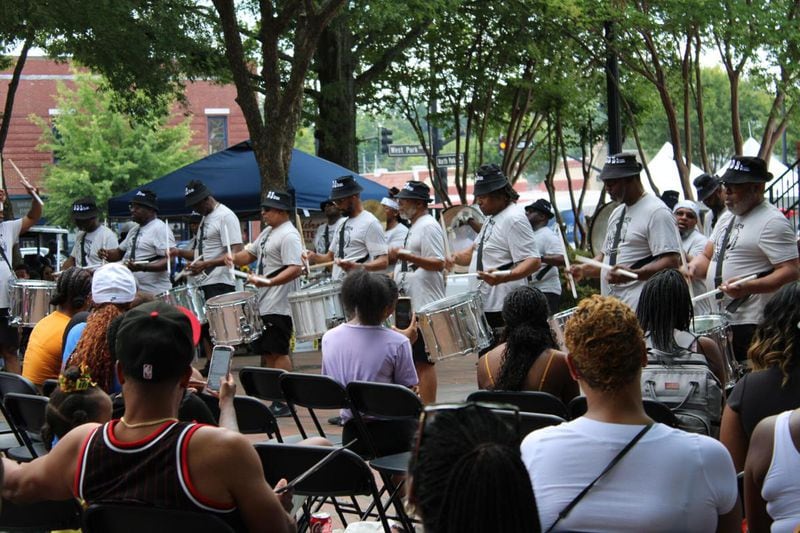 Attendees watch the Atlanta Old School Drummers perform during the 21st Annual Juneteenth Celebration in Marietta on Saturday. (Photo Courtesy of Isabelle Manders)