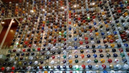 The College Football Hall of Fame in downtown Atlanta displays the helmet of every college football team.