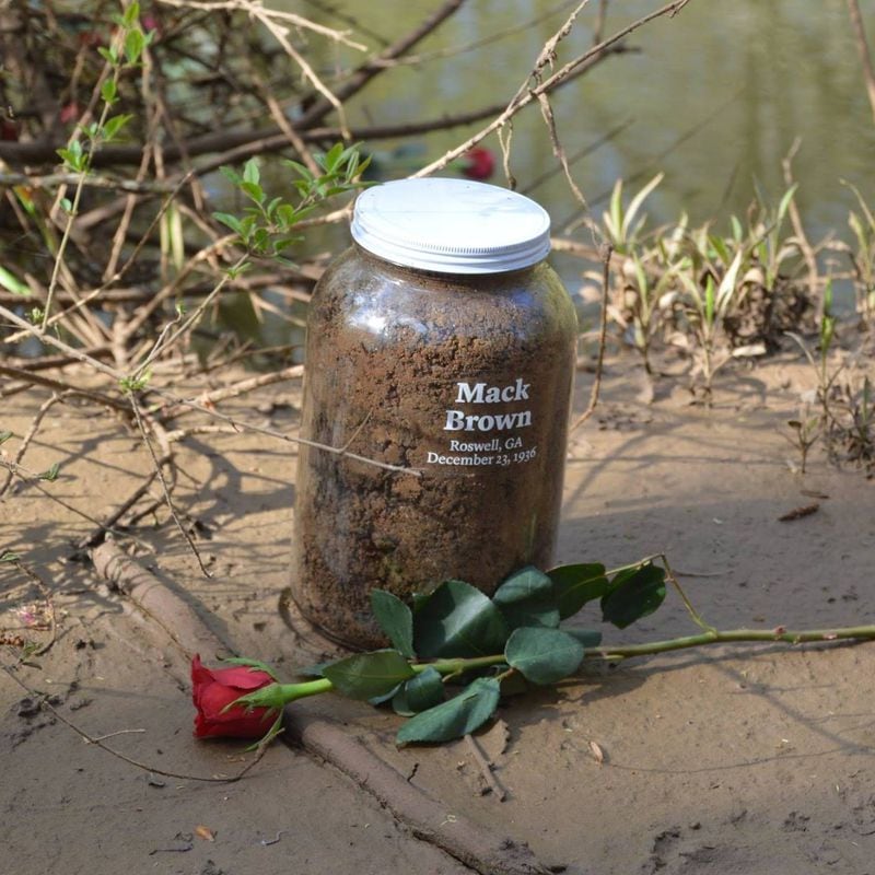 Members from the Fulton County Remembrance Coalition collected soil from the a riverbank near the area where the body of Mack Henry Brown was found in 1936. Photo Courtesy Rev. Patricia Templeton