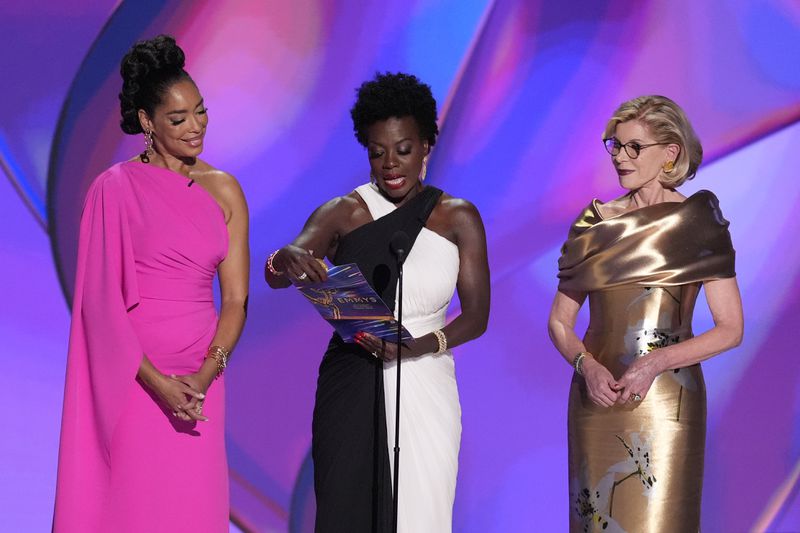 Gina Torres, from left, Viola Davis, and Christine Baranski present the award for outstanding lead actress in a drama series during the 76th Primetime Emmy Awards on Sunday, Sept. 15, 2024, at the Peacock Theater in Los Angeles. (AP Photo/Chris Pizzello)