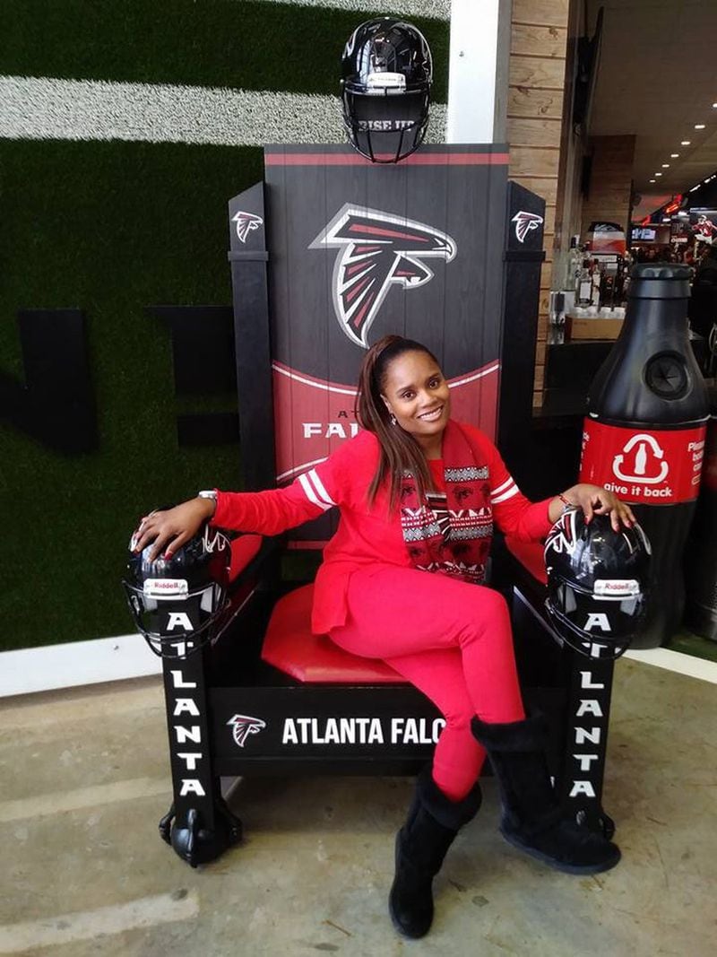 Shanta Yvette Alexander, in a photo taken this year, is a big Atlanta Falcons fan. This photo was taken at Mercedes-Benz Stadium. (Family photo)