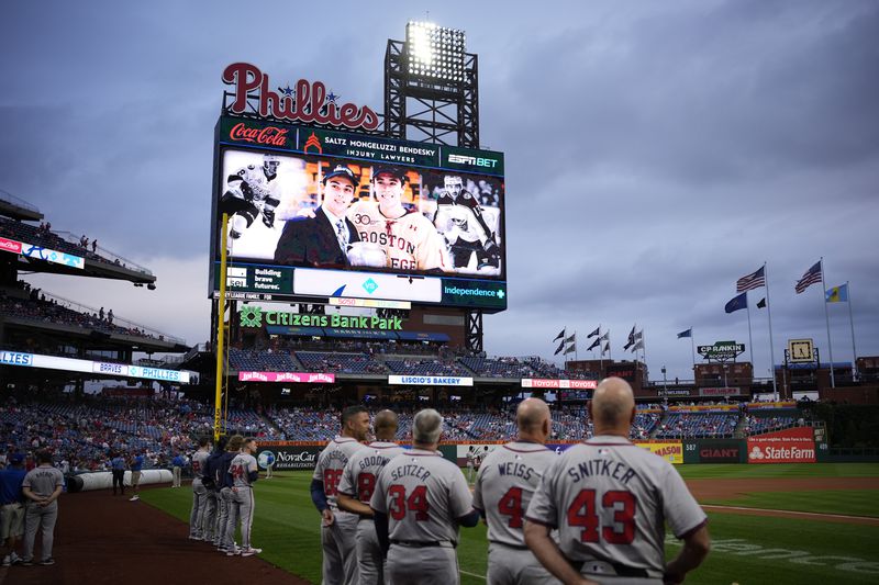 A tribute to Johnny and Matthew Gaudreau is seen before a baseball game between the Philadelphia Phillies and the Atlanta Braves, Friday, Aug. 30, 2024, in Philadelphia. (AP Photo/Matt Slocum)