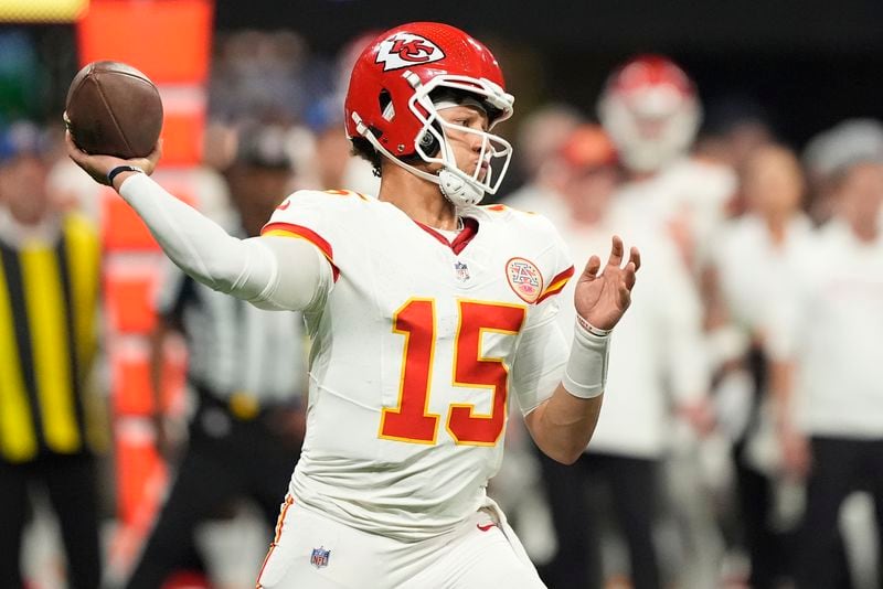 Kansas City Chiefs quarterback Patrick Mahomes works in the pocket against the Atlanta Falcons during the first half of an NFL football game, Sunday, Sept. 22, 2024, in Atlanta. (AP Photo/Brynn Anderson)