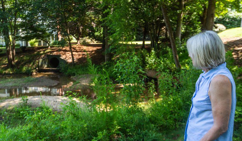 Medlock Bridge in Johns Creek errosion, run off and neglect since the city’s formation has prompted a utility fee to begin to address the problem.