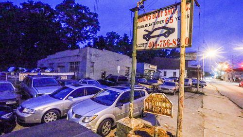 The owner of Gordon’s Body Shop on Ralph David Abernathy Boulevard was found severely beaten inside the shop late Sunday. JOHN SPINK / JSPINK@AJC.COM