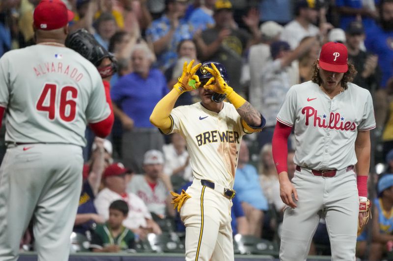 Milwaukee Brewers' Joey Ortiz reacts after hitting an RBI triple during the sixth inning of a baseball game against the Philadelphia Phillies Monday, Sept. 16, 2024, in Milwaukee. (AP Photo/Morry Gash)