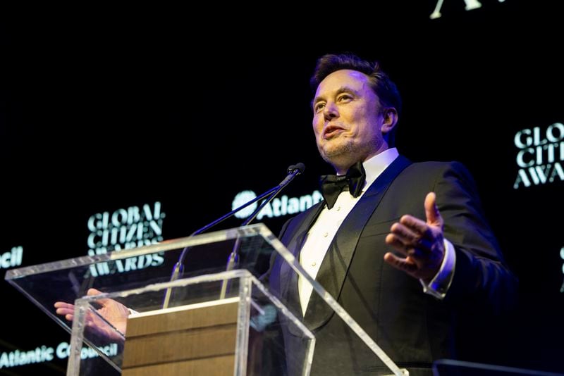 Elon Musk, CEO of Tesla, speaks during the Global Citizen Awards dinner, Monday, Sept. 23, 2024, in New York. (AP Photo/Michelle Farsi)