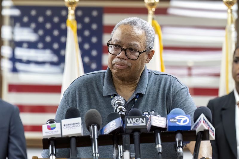 Dorval Carter Jr. President of the Chicago Transit Authority speaks to reporters at the Forest Park Village Hall over the shooting death of four people on a Chicago-area transit Blue Line train yesterday morning, Tuesday, Sept. 3, 2024, in Forest Park, Ill. (Tyler Pasciak LaRiviere/Chicago Sun-Times via AP)