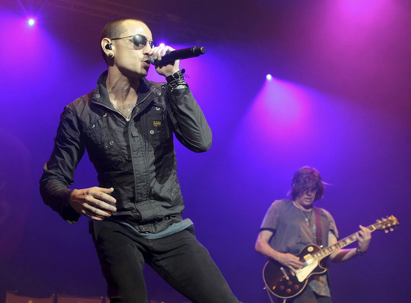 FILE - Chester Bennington, left, performs during the MMRBQ Music Festival 2015 at the Susquehanna Bank Center in Camden, N.J., on May 16, 2015. (Photo by Owen Sweeney/Invision/AP, File)