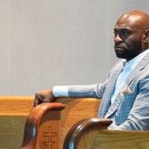 Nathan Wade listens as Fulton County DA Fani Willis addresses the Sixth Episcopal District of the African Methodist Episcopal Church in Marietta on June 13, 2024. (Ben Gray / Ben@BenGray.com)