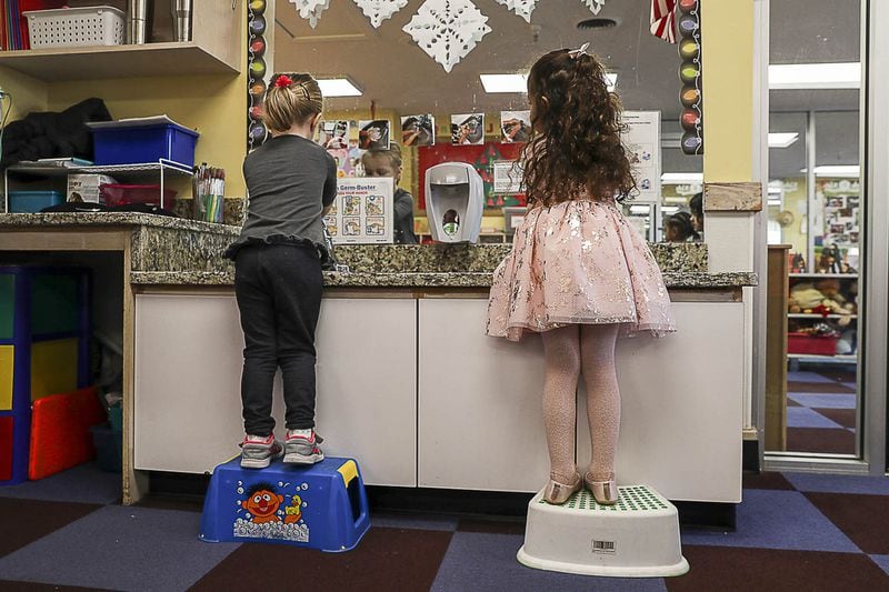 Kids R Kids Learning Academy day care students wash their hands following snack time at the center in Marietta recently. Experts say hand-washing is a key way to prevent spreading germs and getting sick. ALYSSA POINTER / ALYSSA.POINTER@AJC.COM