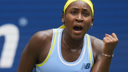 Coco Gauff, of the United States, reacts after scoring a point against Varvara Gracheva, of France, during the first round of the U.S. Open tennis championships, Monday, Aug. 26, 2024, in New York. (AP Photo/Seth Wenig)