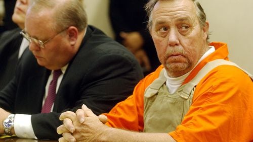 2003 --  Carl M. Patton, right, with his attorneys at a preliminary hearing in Fayette County for four murders that took place in 1977. (MARLENE KARAS/AJC file)