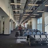 At Hartsfield-Jackson International Airport, workers on September 4, 2024 put the finishing touches on gate areas to complete the first phase of a project to widen Concourse D. Source: Hartsfield-Jackson