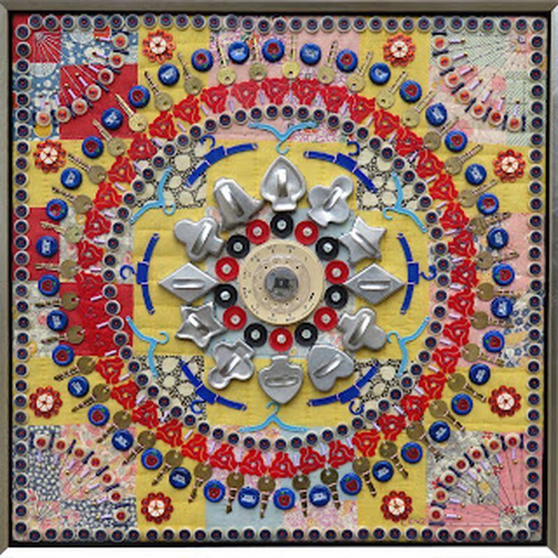 Susan Lenz crafts her mandala pieces from vintage, every-day objects hand- stitched onto quilt fragments. This is “Mandala CXLIV.”