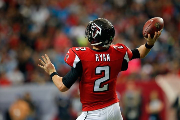 PHOTO: Falcons QB Matt Ryan shows off his Luke Kuechly Panthers jersey 