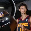 Waiting for the camera to be set, Hawks’ player Zaccharie Risacher #10, gets ready to be interviewed during media day on Monday, Sept 30, 2024 where media outlets including the Associated Press, Getty, NBA and many others gather to take photos, conduct interviews and gather footage.  (Jenni Girtman for The Atlanta Journal-Constitution)