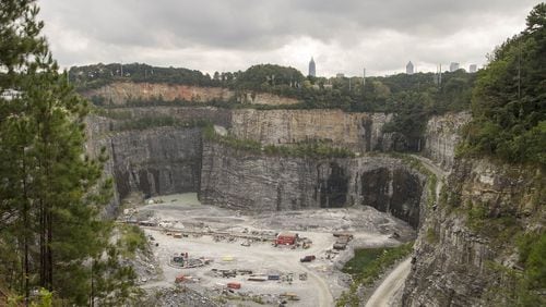 Construction is underway for the new Westside Park at the Bellwood Quarry in Atlanta. The park, planned for years as both a recreational center and reservoir for drinking water, is seen as a potential catalyst for redevelopment of the city’s northwest side. (ALYSSA POINTER/ALYSSA.POINTER@AJC.COM)