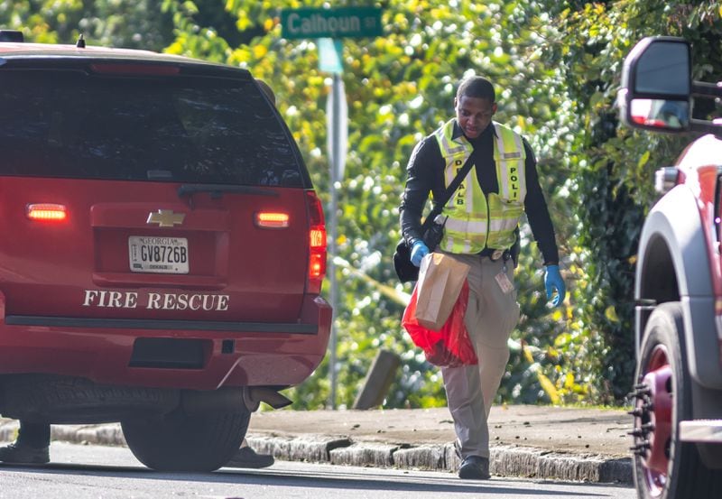 A woman was found dead Monday near the intersection of North Decatur Road and Calhoun Street in DeKalb County, fire officials said. 