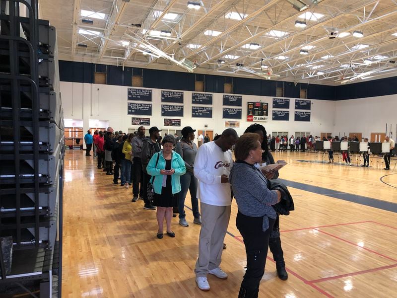 Voters at Luella Middle School in Hampton, Ga. wind around the school gym while waiting to vote on Nov. 6, 2018.