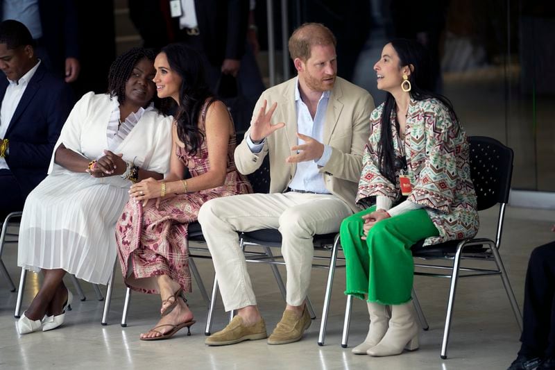 Prince Harry and Meghan attend a welcoming ceremony, at the Delia Zapata National Arts Center, flanked by Colombia's Vice President Francia Márquez, left, and director Xiomara Suescun, in Bogota, Colombia, Thursday, Aug. 15, 2024. (AP Photo/Ivan Valencia)