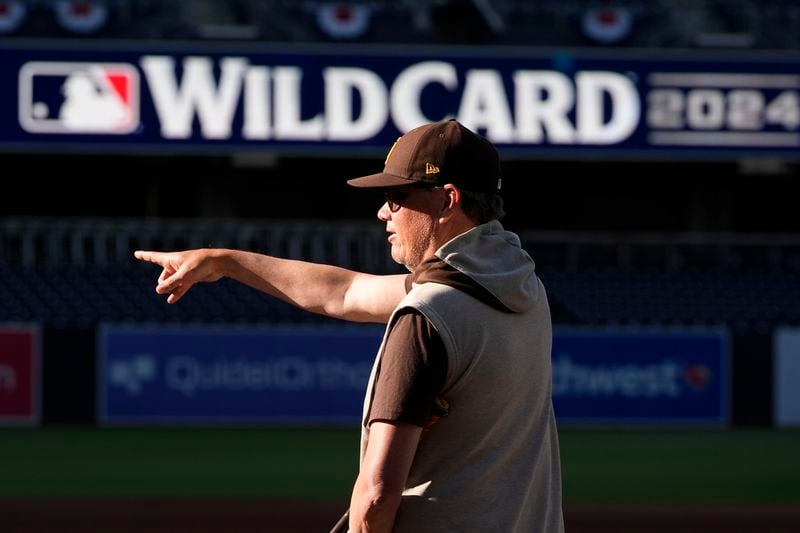 San Diego Padres manager Mike Shildt points during a practice a day before the first game of a National League wild-card baseball series against the Atlanta Braves, Monday, Sept. 30, 2024, in San Diego. (AP Photo/Gregory Bull)