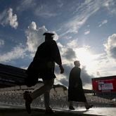 University of Georgia students enter Sanford Stadium during the Spring Undergraduate Ceremony in May 2023. (Jason Getz / Jason.Getz@ajc.com)