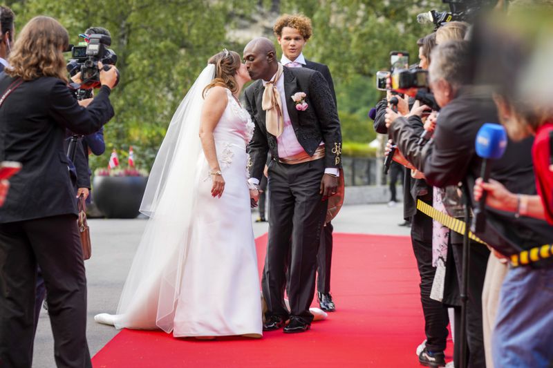 Norway's Princess Martha Louise and Durek Verrett arrive for their wedding party, in Geiranger, Norway, Saturday Aug. 31, 2024. (Heiko Junge/NTB via AP)