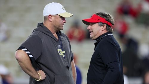 Georgia Tech head coach Brent Key talks with Georgia head coach Kirby Smart before their game at Bobby Dodd Stadium, Saturday, November 25, 2023, in Atlanta. (Jason Getz / Jason.Getz@ajc.com)