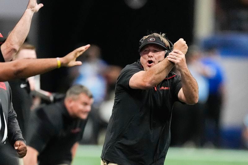 Georgia head coach Kirby Smart reacts during the first half of an NCAA college football game against Clemson Aug. 31, 2024, in Atlanta. (AP Photo/John Bazemore)