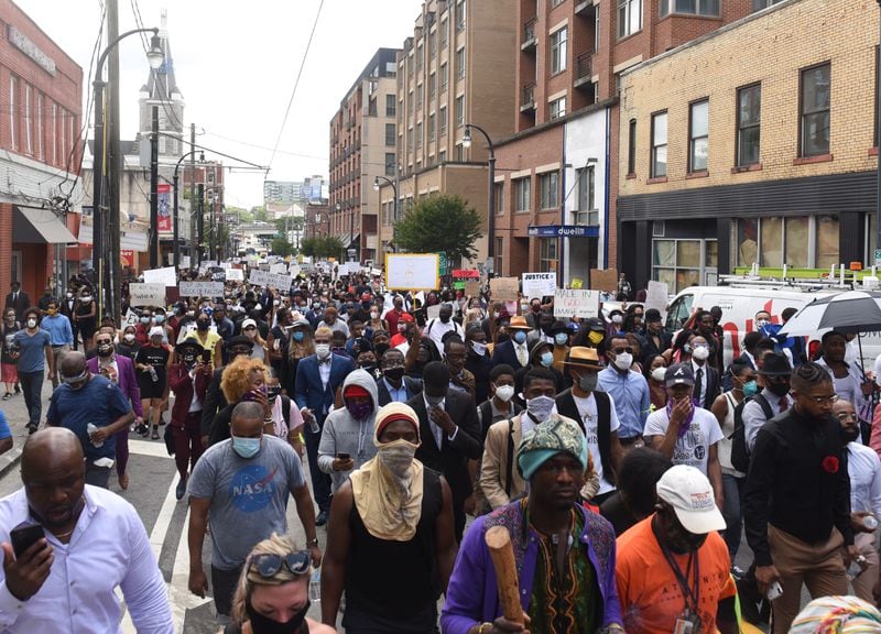 “We stood together and we marched 2.5 miles, and we honored Martin Luther King Jr. along the way,” Atlanta City Councilman Antonio Brown said. “This is what peaceful protesting is about.”